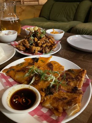 Kimchi pancake and fried mushrooms in the back  at Yulli's Brews in Alexandria
