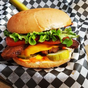 The Renegade Burger with a cheeze slice and homemade "bacun". at Renegade Kitchen & Craft Bar in Kelowna