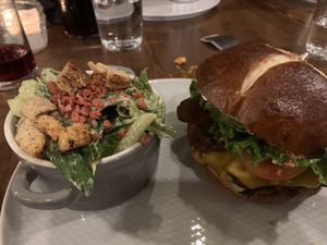 Renegade Burger with side Caesar Salad at Renegade Kitchen & Craft Bar in Kelowna