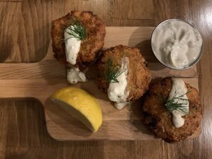 Vegan Crab Cakes with Tzaziki sauce  at Renegade Kitchen & Craft Bar in Kelowna