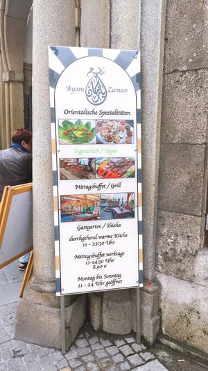 sign outside at Ayam Zaman in Linz