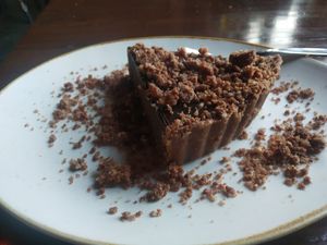 Chocolate coconut cream cake at Roadhouse Cafe & Nom Yum Delivery in New Delhi