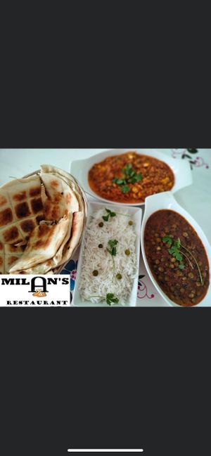 Aloo matar rice garlic naan   at Milan's Restaurant in Moshi