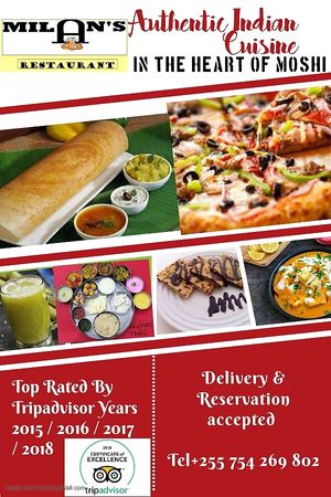 Sugar cane juice Dosa pizza Thali paneer butter masala   at Milan's Restaurant in Moshi