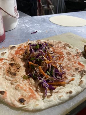 Veg wrap in preparation   at Milan's Restaurant in Moshi