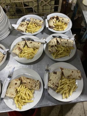 Veggie wraps on preparation   at Milan's Restaurant in Moshi