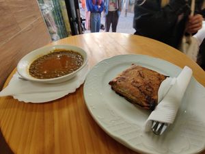 Lentejas (brown lentil soup) and empanada de espinaca (spinach empanada) at Papas Elvira in Granada