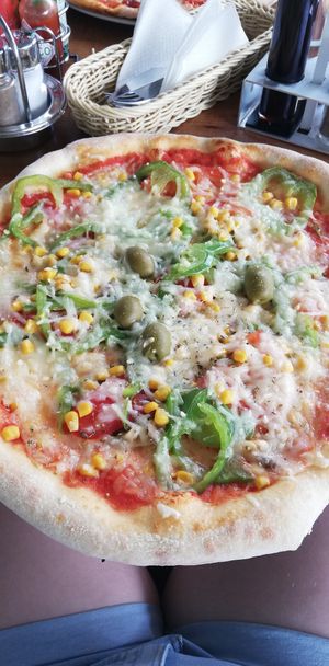 Vegetarian pizza with vegan cheese at Pizzeria Osmica in Sentjur