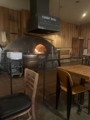 Pizza oven right in the dining room!   at Full Of Life Flatbread in Los Alamos