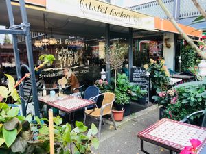 Outdoor seating at Falafel Factory - Barmbeker Market in Hamburg