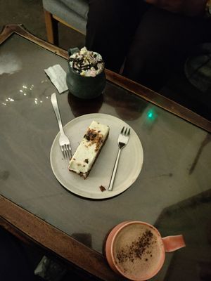 hot chocolate with coconut cream and marshmallows, carrot cake, hot chocolate at The Old Gun Shop Café & Pantry in Lancaster