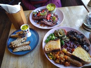 Right: Herb big breakfast. Left: Dippy Egg. Top: Cinnamon French Toast. at The Old Gun Shop Café & Pantry in Lancaster