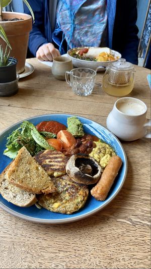 Vegan big breakfast and oat milk latte at The Old Gun Shop Café & Pantry in Lancaster