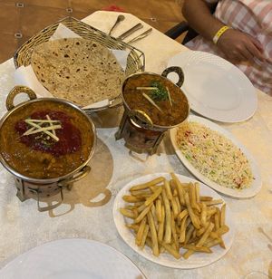 Lamb rogan josh with pilau rice and chips (& vegan garlic chapati at Torviscas Spice Village in Tenerife