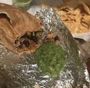 Tofu black bean burrito and avocado salsa at Moe's Southwest Grill in Midland