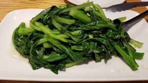 Sauteed choy sum at Bodai Vegetarian in Brooklyn