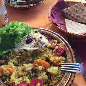 Biriyani rice with vegetables and nuts. Hummus on top at Frary's in Venice