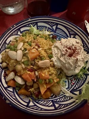 Magluba vegana, piatto giordano di riso speziato con carote, patate, uvetta e hummus  at Frary's in Venice