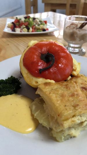 Typical Peruvian plate from Arequipa rocoto relleno and pastel de papa at Namaste Coffee in Lima