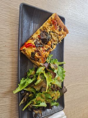 Focaccia with aubergine tomato and vegan cheese at Amour Patisserie Vegetale in Nice
