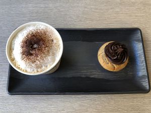 Muffin and Coffee with Almond Milk at Amour Patisserie Vegetale in Nice