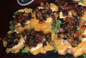 Plantain Pizza Medallions. at Cuba's Cookin' in Oranjestad