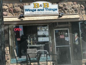 Storefront. Only one table outside. Otherwise the business is for takeaway. at B & B Wings & Things in Middletown