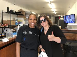 Owner Rita and one happy customer! at B & B Wings & Things in Middletown