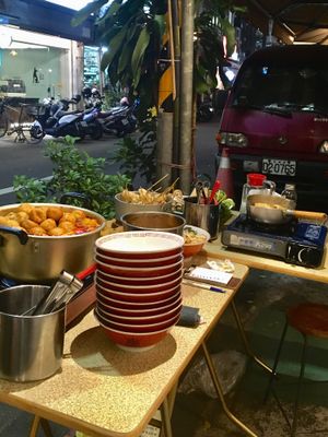 Food preparation in front of the shop. at TàiLáng ZhōngHuá Lāmiàn in Tainan