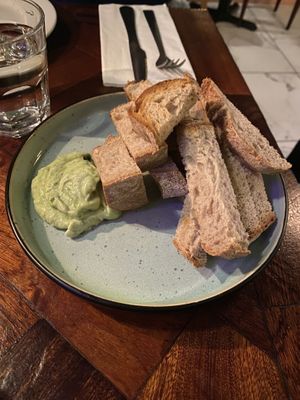Bread with a whipped parsley flavoured dip   at The Black Pig with White Pearls in North London