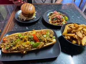 Guac n roll burger, tacos, Philly cheese steak, and chips at Guac 'n' Roll in Liverpool