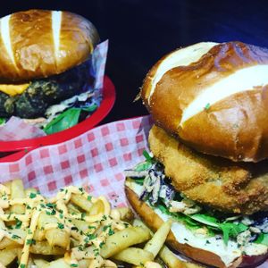 Mac n cheese burger and a seitan burger. Fries covered in Taproom sauce. 

Lovely stuff! at Guac 'n' Roll in Liverpool