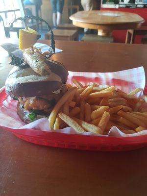 Smoky tofish burger and fries at Guac 'n' Roll in Liverpool