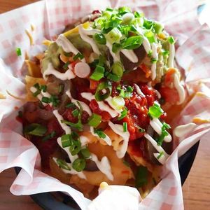 Nachos with all homemade toppings! at Guac 'n' Roll in Liverpool