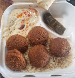 Falafel plate and stuffed grape leaves, I ate one. at Pita Barn in Victorville