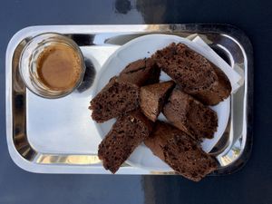Chambelland Cacao bread with espresso drink.  at Chambelland in Paris