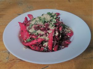 Beetroot Pasta with Cashew Parmesan at Import Export in Munich