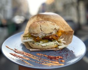 BRIOCHE
homemade brioche, vegan 'beef', cheddar cheese, mango salsa, red onion, sweet cucumber, jalapeño, soyonese & coriander
 at Relax na Wilczej in Warsaw