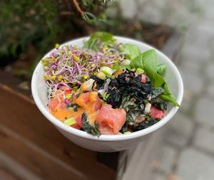 BOWL POKE TUNA
'tuna' made of tomatoes served on rise with cucumber, edamame, nori, 
sriracha sauce & sesame seeds
 at Relax na Wilczej in Warsaw