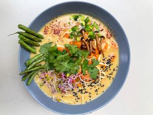 THOM KHA SOUP (mild/spicy)
warming soup on coconut milk with udon noodles, carrot, celery, string beans, 
shimeji mushrooms & chives
 at Relax na Wilczej in Warsaw