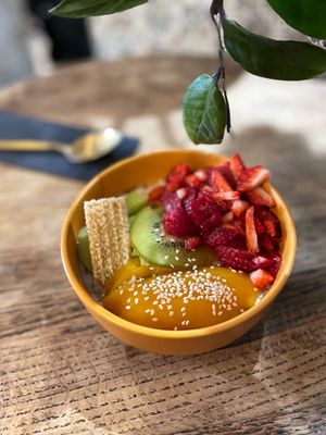 MANGO STICKY RICE (V,GF) - coconut rice pudding withmango, strawberry coulis, kiwi, spicy coconut caramel& sesame seeds at Relax na Wilczej in Warsaw