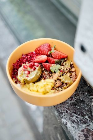 ‘LABNEH’ GRANOLA 
sweet ‘labneh’/halvah paste/raspberries/pineapple/homemade granola
with roasted coffee beans/passion fruit/pistacchio paste
 at Relax na Wilczej in Warsaw