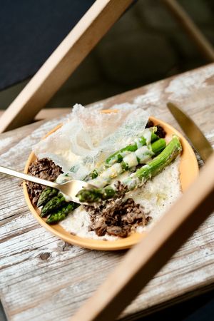 ASPARAGUS (GF)
'hollandaise' sauce/ cashew nut cream/lemon zest/rice chips/champignons
 at Relax na Wilczej in Warsaw