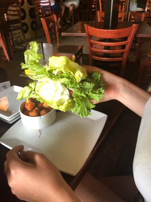 no vegan burger bun lmao (if you look close enough you may see the beyond pattie between the salad 😂) at Charbar Company in Hilton Head Island