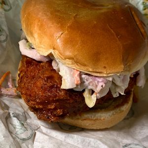 Nashville Hot "Chicken" Sandwich: Coleslaw, Pickles, Mayo on a Toasted Bun at Plant Power Fast Food in Redlands