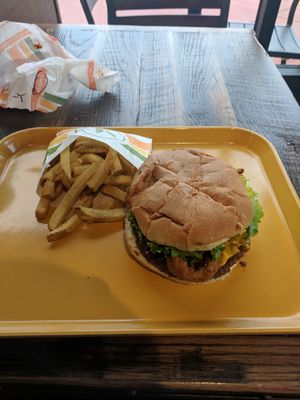 A 'beef' burger with BBQ sauce and french fries.

February 16, 2019 at Plant Power Fast Food in Redlands