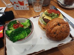 moving mountains burger with a side of garlic and chilly broccoli at Eatwell in Beckenham