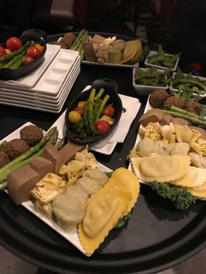 Tofu, asparagus, pastas, and vegetable polpettes. at The Melting Pot in Red Bank