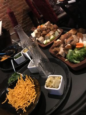 Broccoli, cauliflower, carrots, breads, spinach, and artichoke. at The Melting Pot in Red Bank