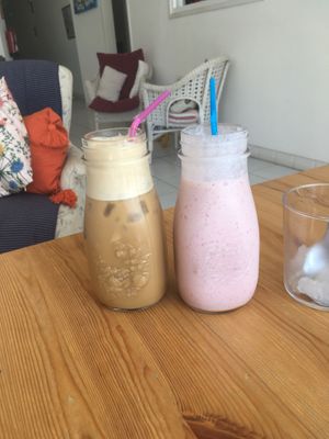 Strawberry milkshake with soymilk and iced coffee at deli on the hill in Tenerife